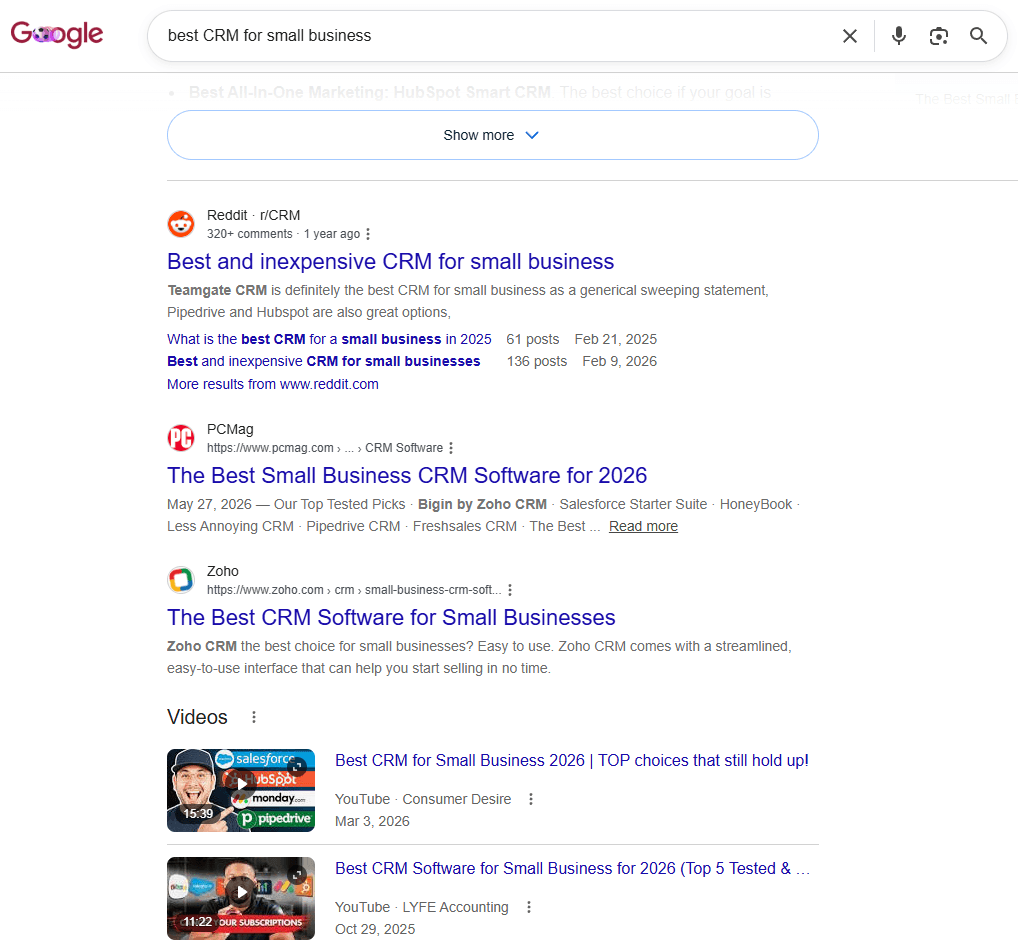 Google search results for "best CRM for small business" showing Reddit, review articles, Zoho, and video results